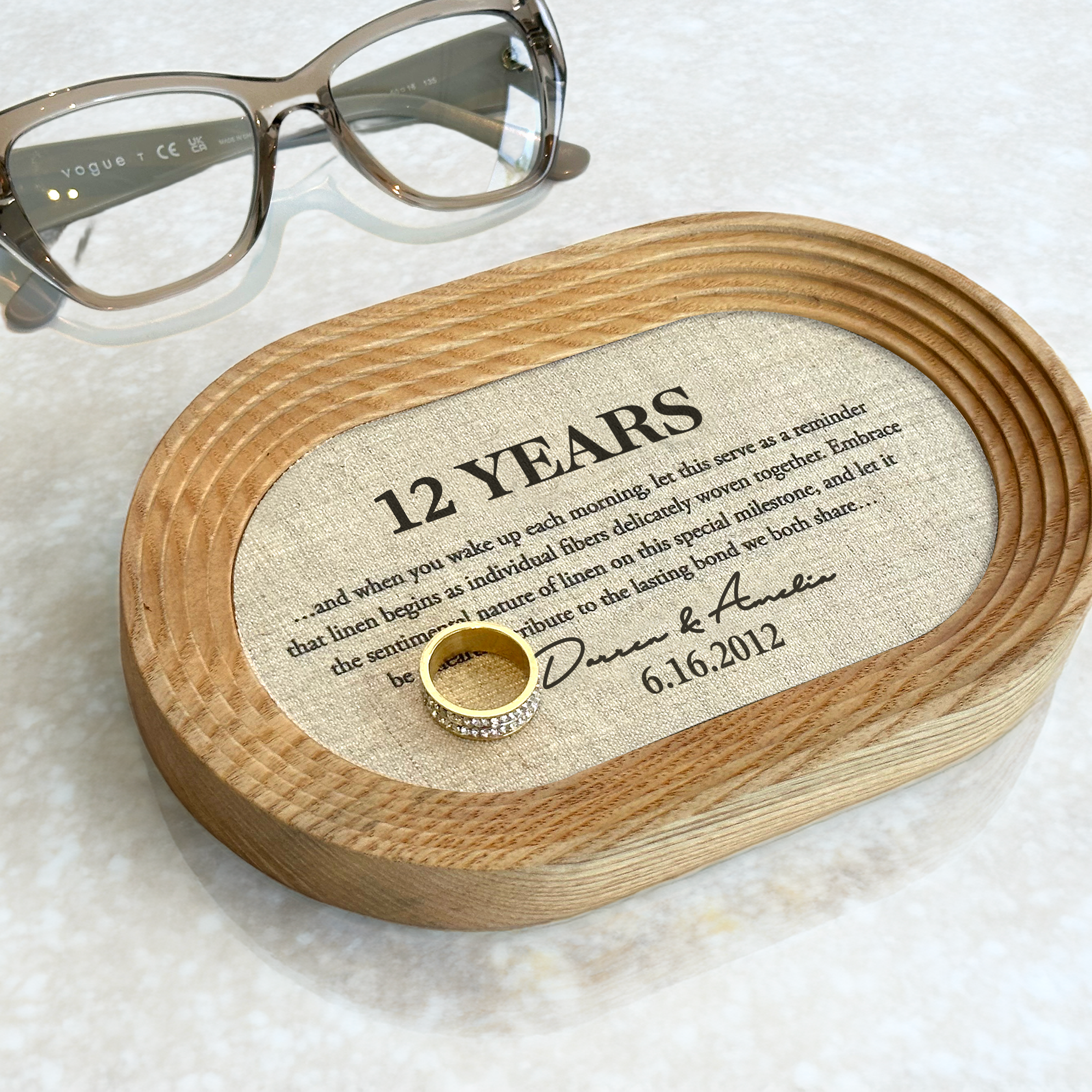 Customizable catchall tray with linen for 12 year anniversary celebration